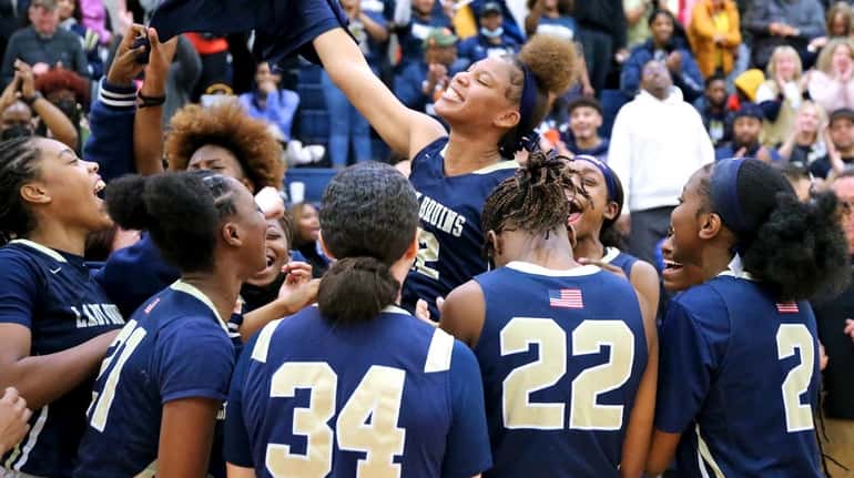 Baldwin celebrates after defeating Longwood in the Long Island Class...