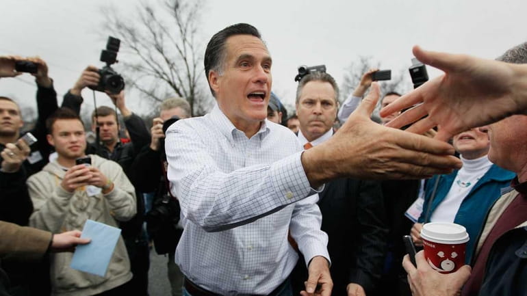 Republican presidential candidate, former Massachusetts Gov. Mitt Romney greets people...