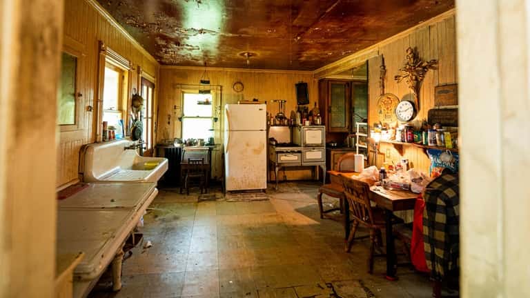 The kitchen of an 1890 farmhouse in Center Moriches has original...