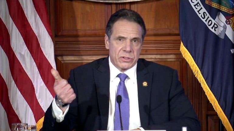 Governor Andrew Cuomo holds a press briefing in Albany on...