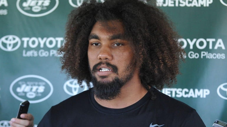 Leonard Williams of the Jets speaks with the media after...