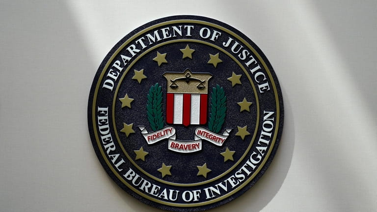 An FBI seal is seen on a wall on Aug....