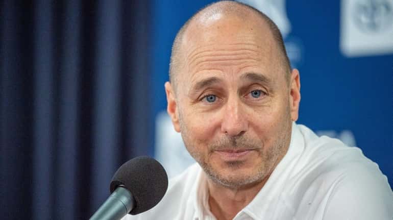Yankees' Brian Cashman speaks at a news conference at spring...