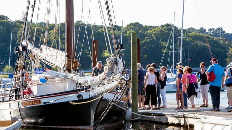 Passengers board on the WaterFront Center's oyster sloop Christeen for the...