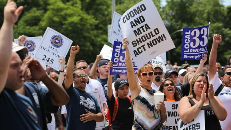 Long Island Rail Road union workers and supporters call on...