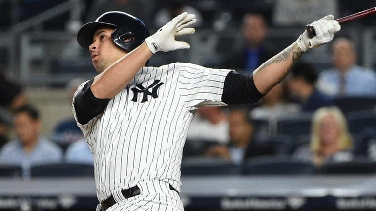 New York Yankees designated hitter Gary Sanchez hits a two-run...