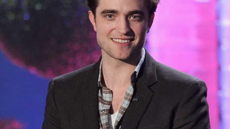 Actor Robert Pattinson onstage during the 2011 MTV Movie Awards...