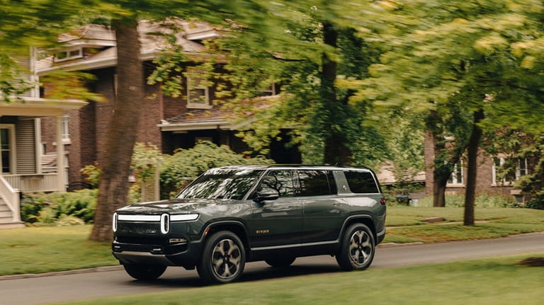This photo provided by Rivian shows the 2024 R1S. The...
