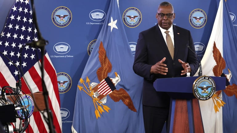 Secretary of Defense Lloyd Austin speaks during a press conference...