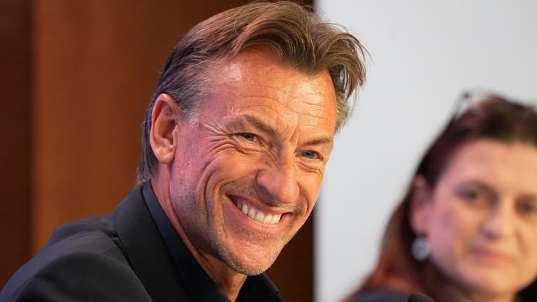 French coach Herve Renard smiles during press conference at the...