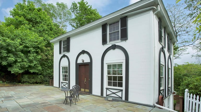 Enter this Roslyn home through double mahogany doors. There are...