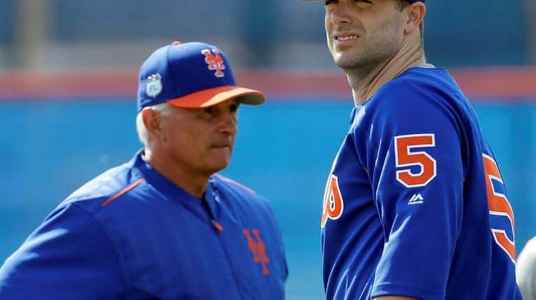 Mets manager Terry Collins and team captain David Wright during...
