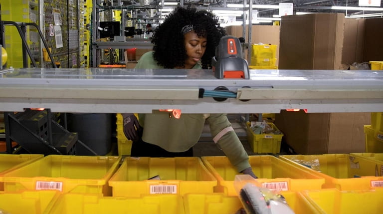 Nytasha Braddy, a "stower" at the Amazon fulfillment center on...
