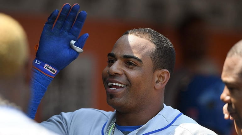 Yoenis Cespedes hits the first of his two solo home...
