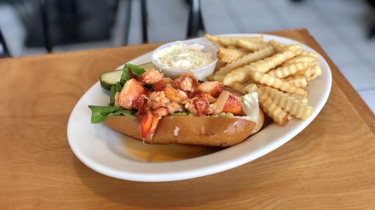 Varney's in Brookhaven serves a hot-buttered lobster roll, pictured, as...
