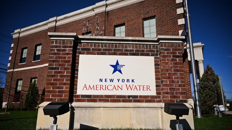 The sign in front of the New York American Water...