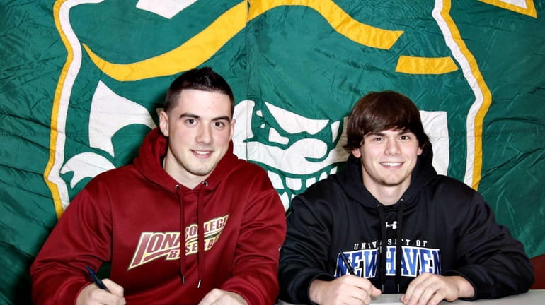 Chris Russo, left, and Nick Russo, right, of Floyd, sign...
