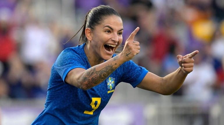 Debinha (9) celebrates after scoring a goal during the second...