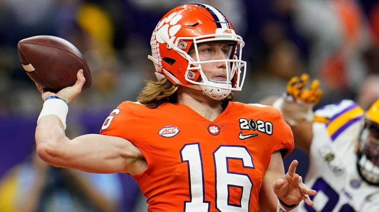 Clemson quarterback Trevor Lawrence passes against LSU during the first...
