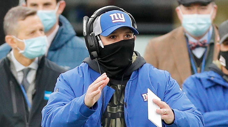 Head coach Joe Judge of the Giants looks on in...