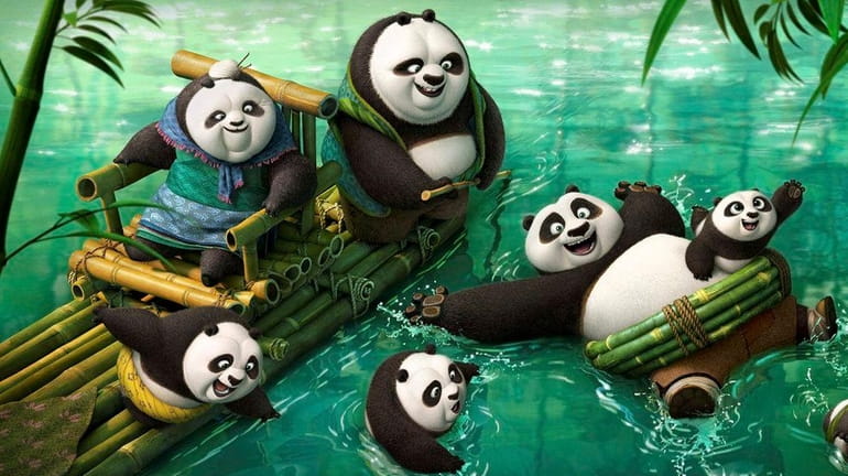 Po (voiced by Jack Black) frolicking in the panda village's...