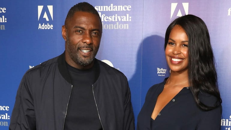Idris Elba and Sabrina Dhowre attend the "Yardie" premiere during the...
