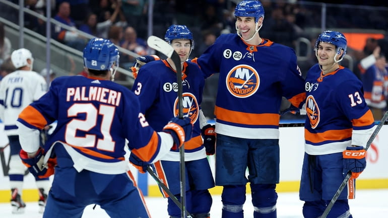 New York Islanders defenseman Zdeno Chara (33) celebrates his goal...