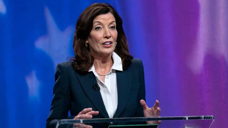 New York Governor Kathy Hochul speaks as she faces off...