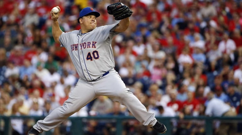 Mets' Bartolo Colon pitches during the third inning of a...