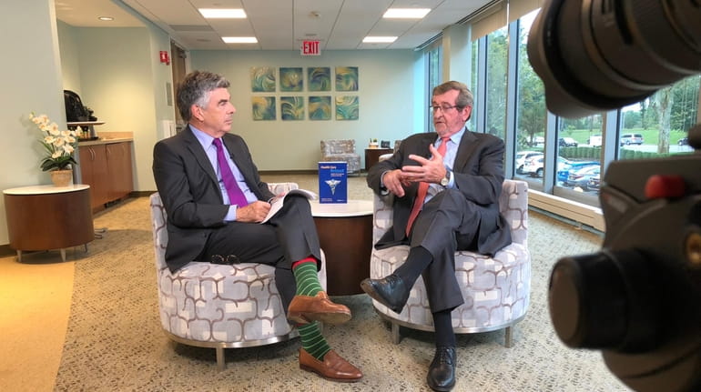 Northwell Health CEO Michael Dowling talks to Charles Kenney, who co-authored...