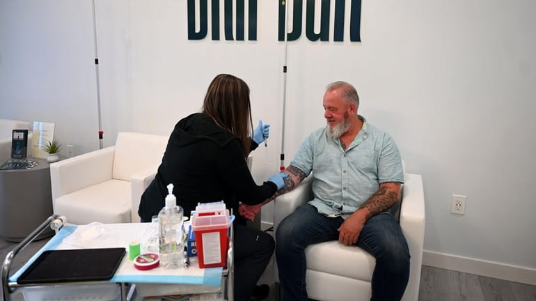 Scott Eger receives an IV vitamin infusion at DRIPBaR in Commack.