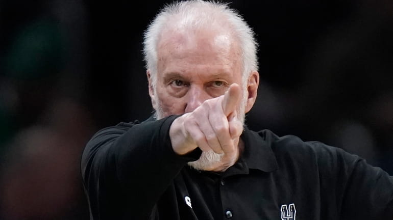 San Antonio Spurs head coach Gregg Popovich points from the...