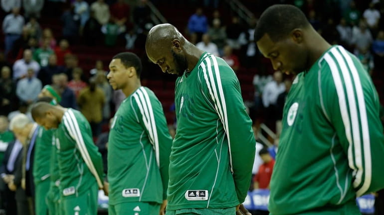 Members of the Boston Celtics take a moment to remember...