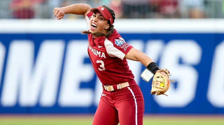 Oklahoma shortstop Grace Lyons (3) celebrates after tagging out Texas'...