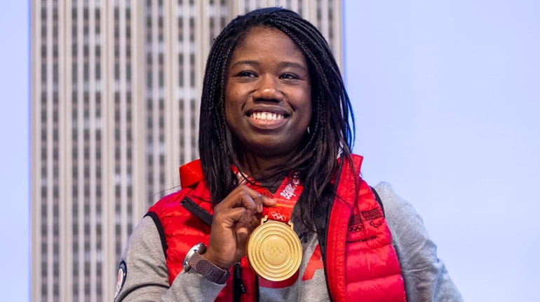 Erin Jackson, Olympic gold medalist in speed skating, poses for...