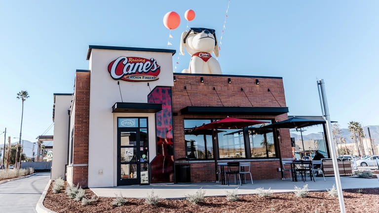 A Raising Cane’s Chicken Fingers location.  The chain is named...