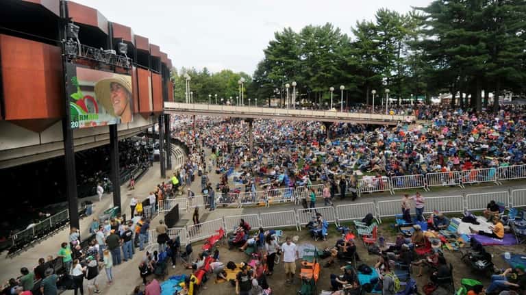 Fans enjoy the music during a concert at Saratoga Performing Arts...