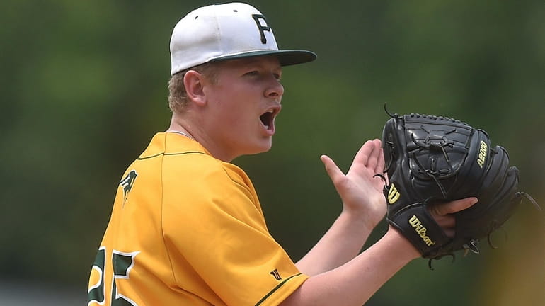 Ryan Hynes, Ward Melville pitcher, reacts after the final out...