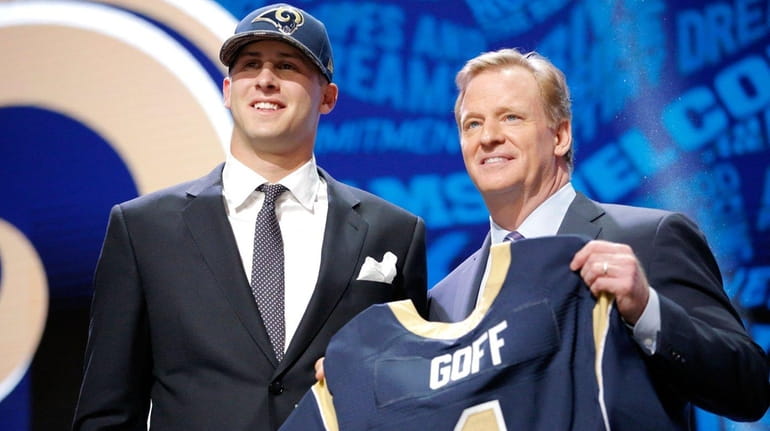 Jared Goff of the California Golden Bears holds up a...
