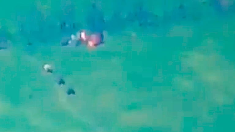 This photo taken from video released by Russian Defense Ministry...