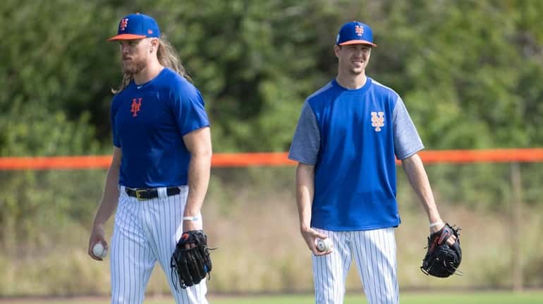 Mets pitchers Noah Syndergaard and Jacob deGrom during a spring...