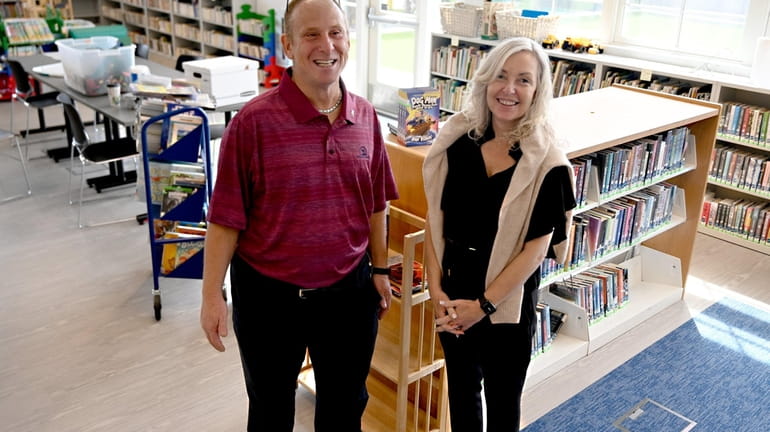 Mastics-Moriches-Shirley library board president Joe Maiorana and library director Kerri...