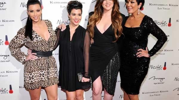 An undated photo shows (left to right), Kim Kardashian, Kourtney...