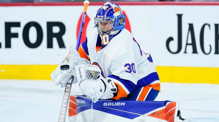 New York Islanders' Ilya Sorokin blocks a shot during the...