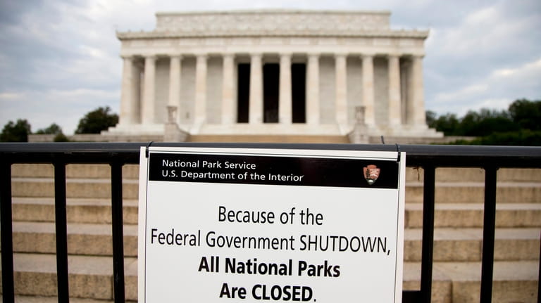 A sign reading "Because of the Federal Government SHUTDOWN All...