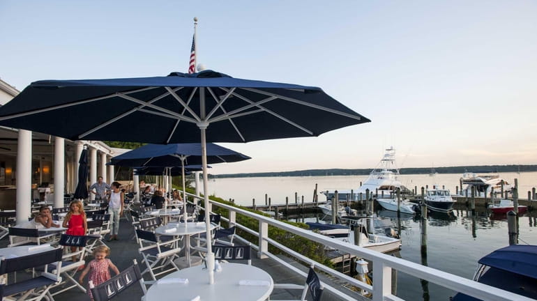 East Hampton Point's deck overlooks Three Mile Harbor. (July 15,...