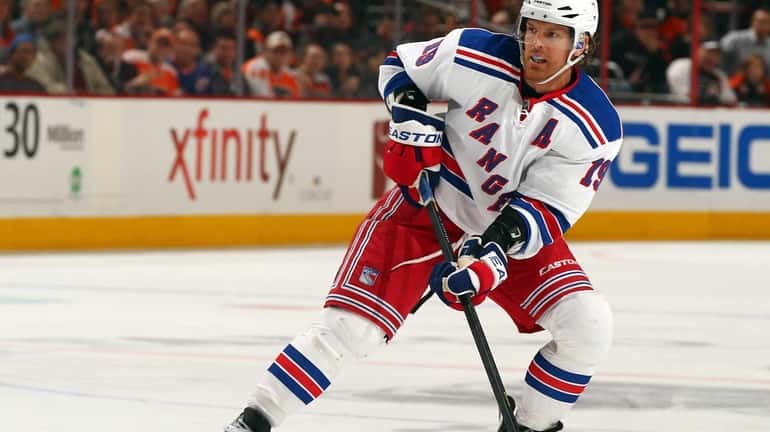 Brad Richards looks to pass in the third period of...