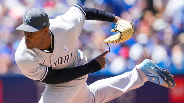 Luis Severino of the Yankees pitches to the Blue Jays...