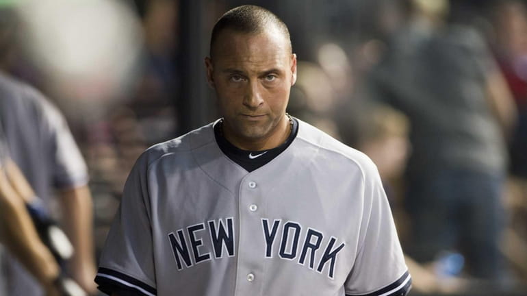 Derek Jeter reacts after striking out during the fifth inning...