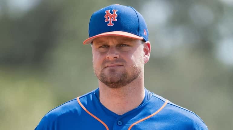 Lucas Duda stretching on Monday Feb. 20, 2017 during a...